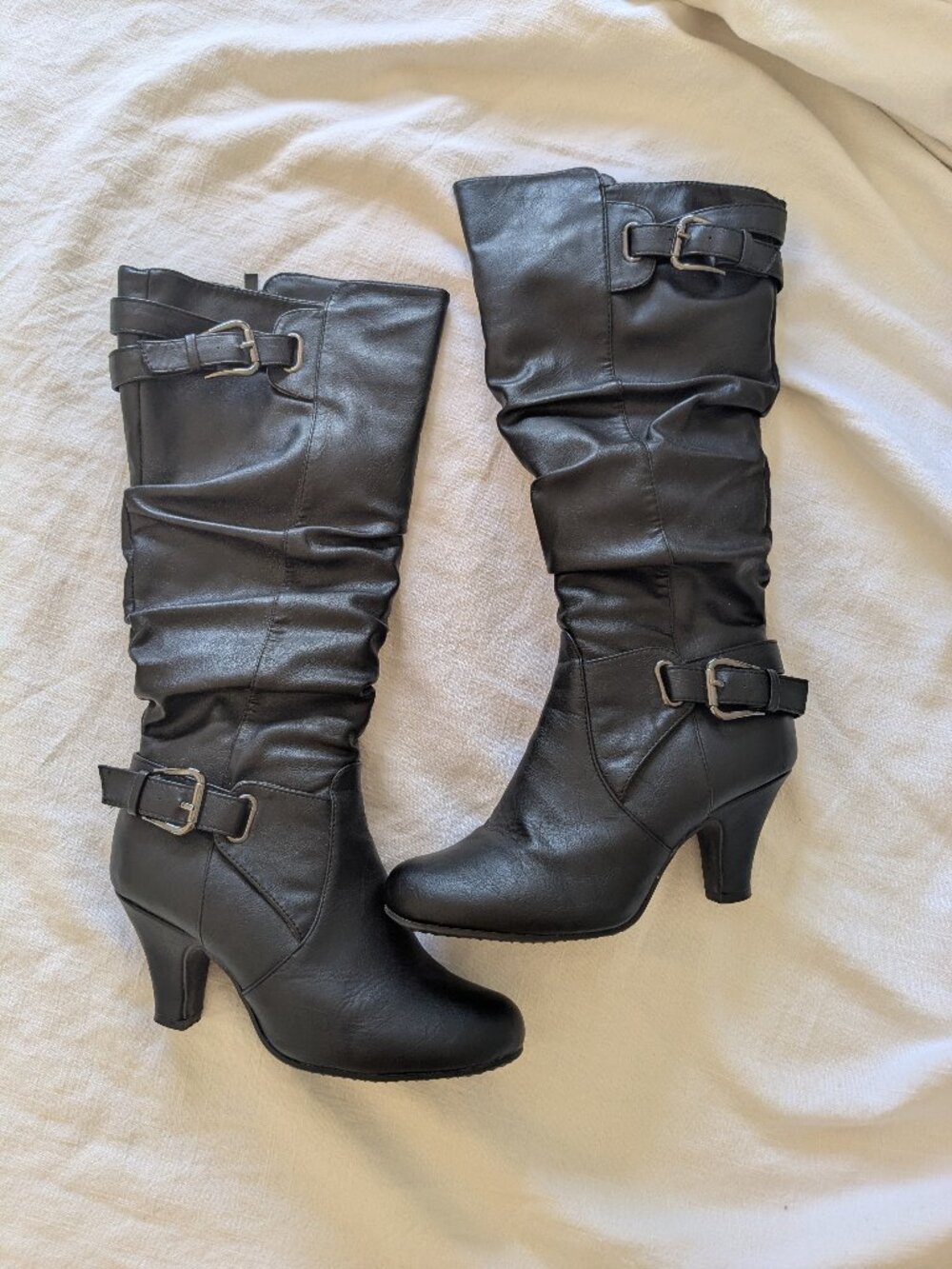Black tall heeled boots